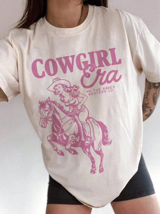T-shirt imprimé à manches courtes et col rond avec imprimé graphique de cow-girl et cheval, idéal pour l'été ou le printemps