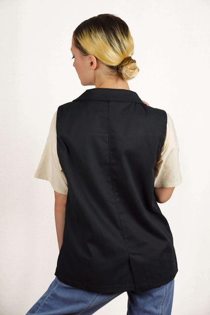 LA VESTE SANS MANCHES