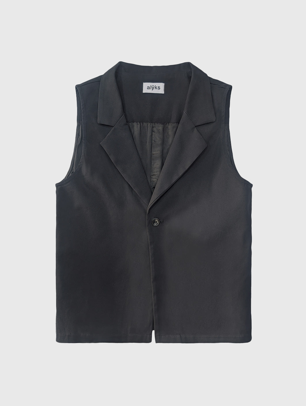 LA VESTE SANS MANCHES