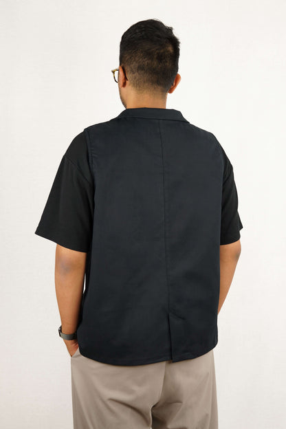 LA VESTE SANS MANCHES